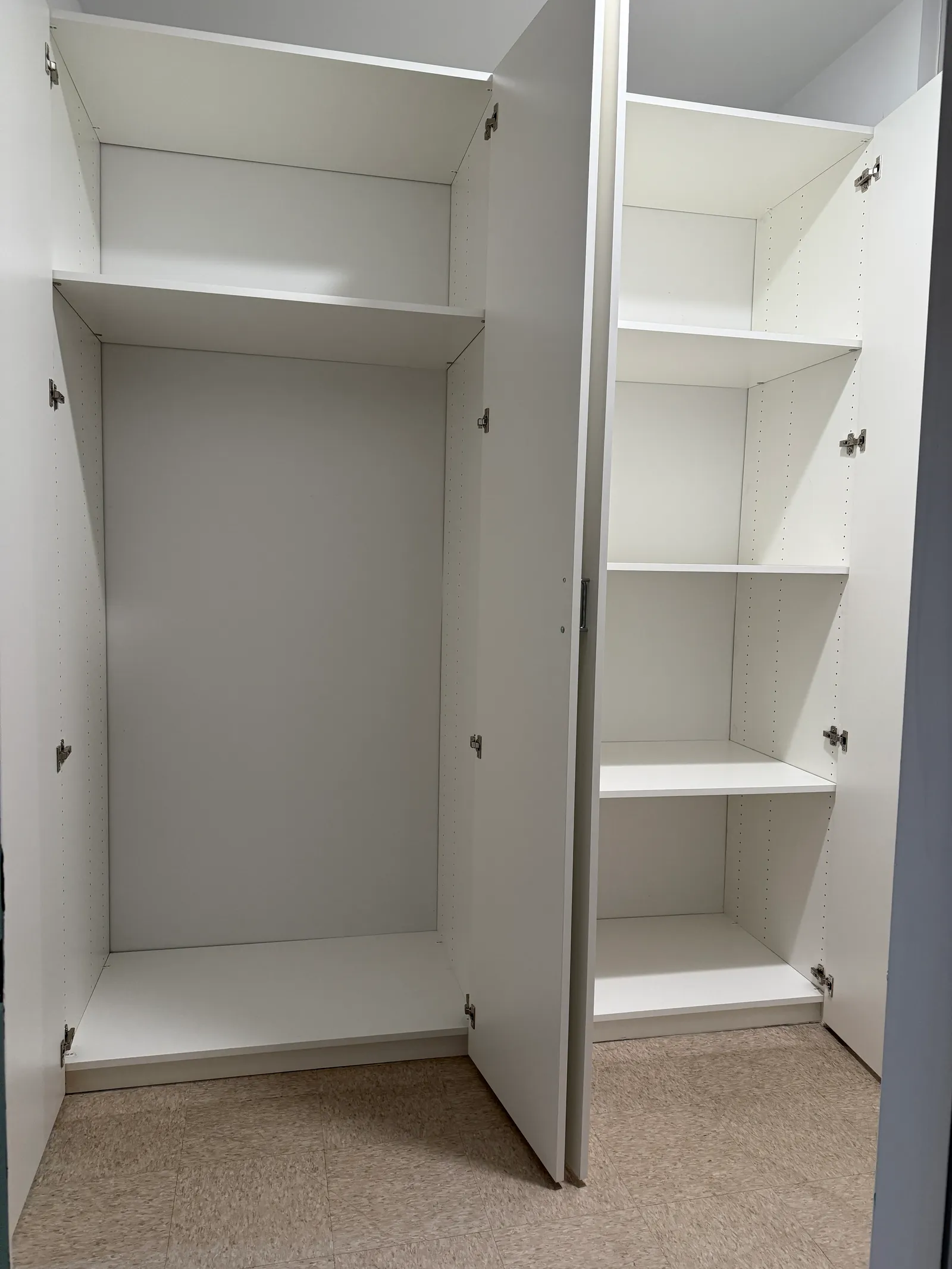 Interior of custom storage system with shelves and tall compartment in Glendale