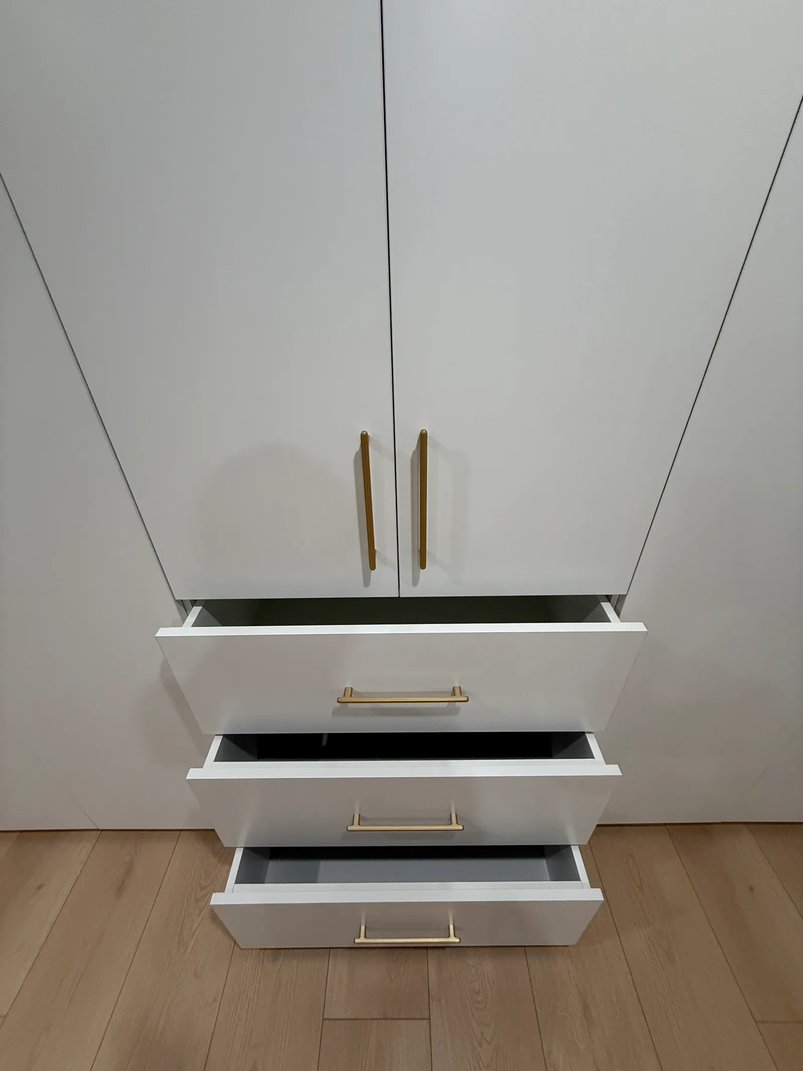 Built-in wardrobe drawer storage with white matte finish